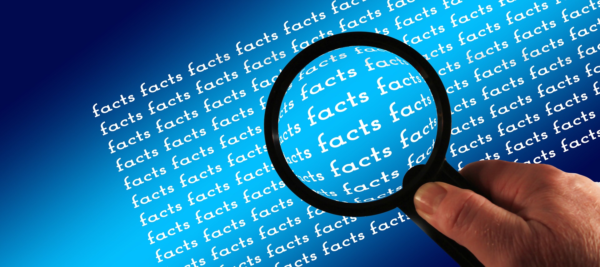 magnifying glass on facts