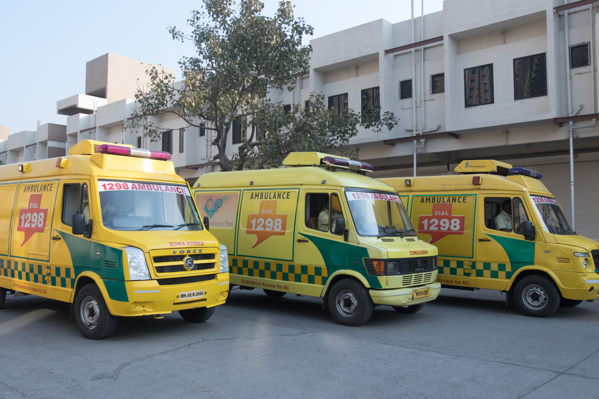 Ambulances of Ziquitza parked near a hospital